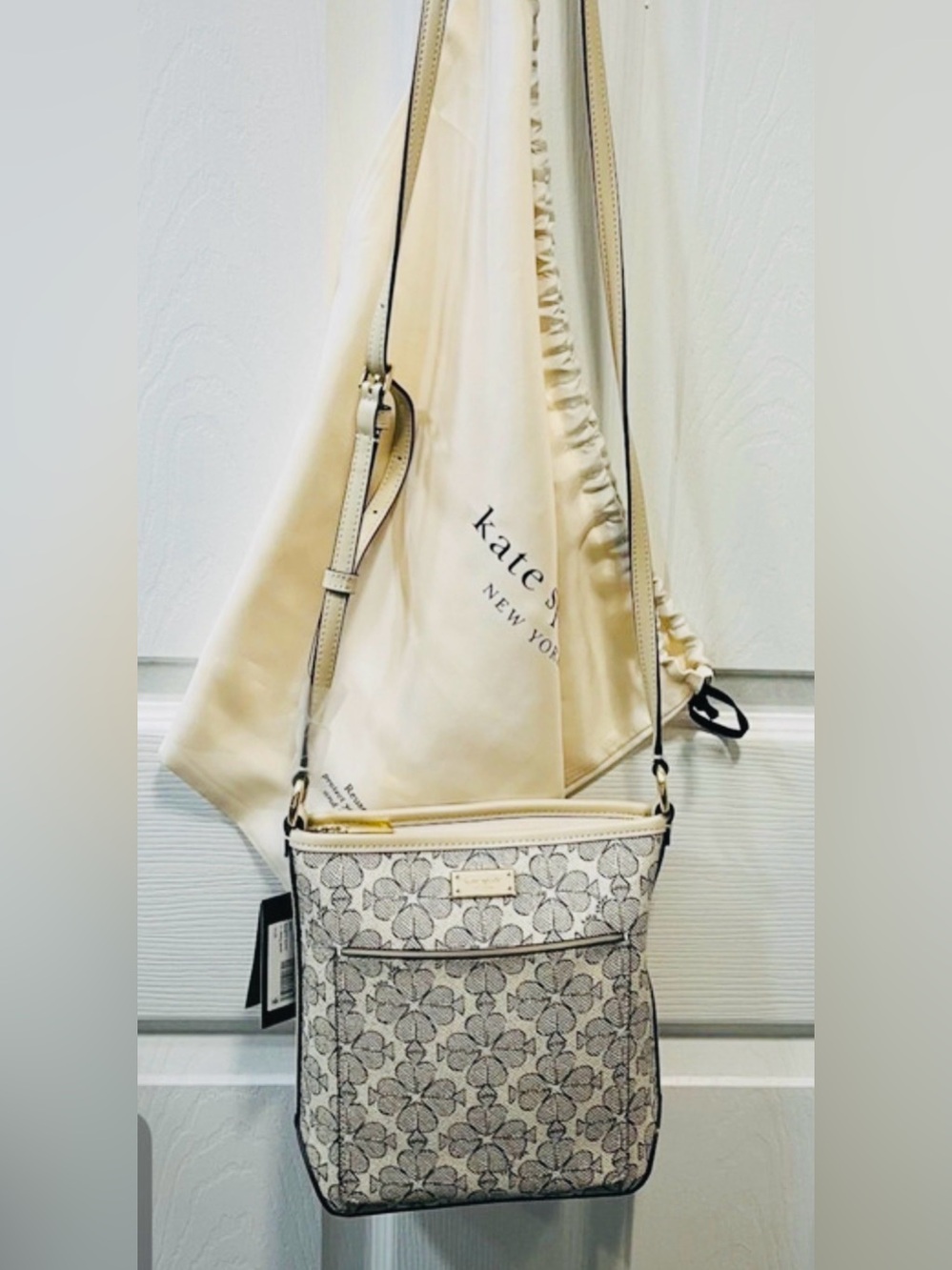 kate spade Spade Flower Small Swingback in Coated Canvas & Leather.